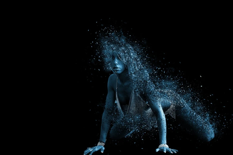 a woman covered in powder on a black background, by Alberto Seveso, digital art, blue particles, with glowing runes on the body, chris cunningham, dynamic dance photography