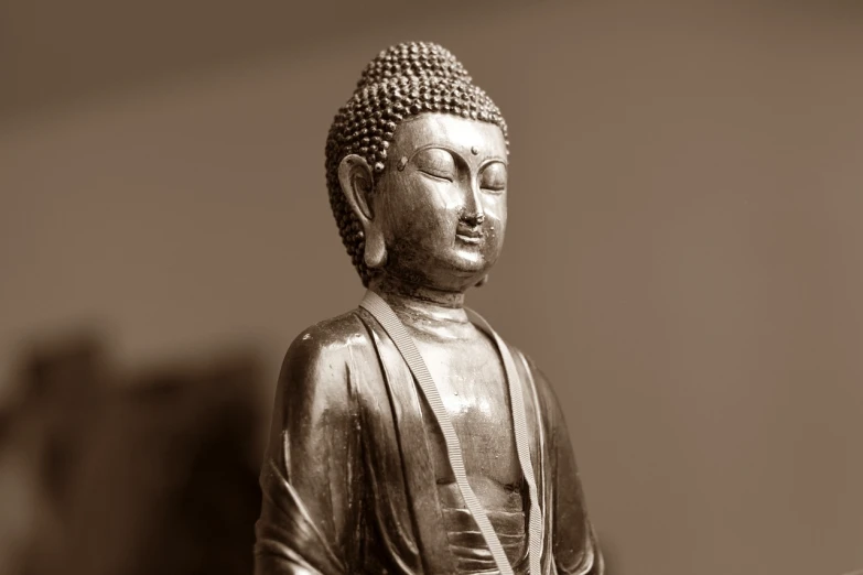 a black and white photo of a buddha statue, a statue, by Caroline Mytinger, sepia, museum photo