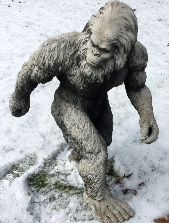 a statue of a gorilla in the snow, a statue, inspired by Yue Minjun, running towards the camera, rabbit groot as marble statue, he has goat man legs, wikipedia