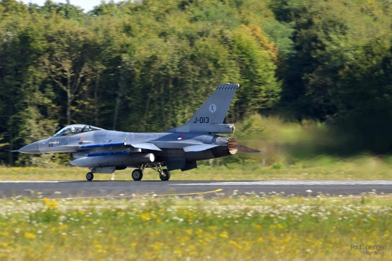 a fighter jet taking off from an airport runway, a picture, by Juergen von Huendeberg, flickr, 1 2 0 mm f 1 6, air is being pushed around him, banner, 9/11