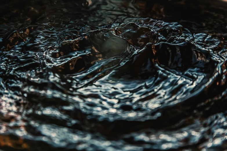 a close up of a frying pan filled with oil, by Matija Jama, unsplash, digital art, water flowing through the sewer, dark but detailed digital art, rippling muscles, sculpture made of water