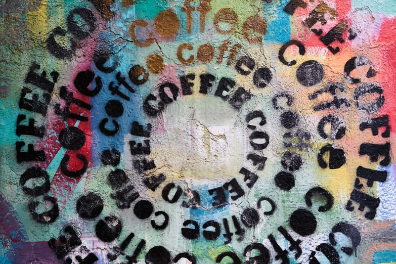 a close up of a wall with graffiti on it, graffiti art, inspired by Wolf Vostell, graffiti, drink more coffee, concentric circles, grungy; oil on canvas, grungy; colorful