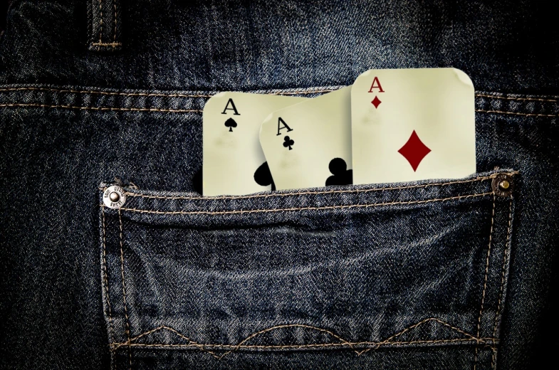 four of a kind of playing cards sticking out of a pocket, by Eugeniusz Zak, shutterstock, double denim, letter a, photo illustration, 7 0 s photo