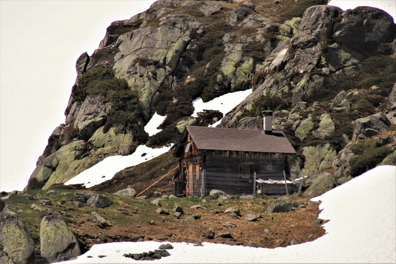 a small cabin sitting on top of a snow covered mountain, a photo, by Magdalene Bärens, pixabay, renaissance, interior of a mountain hut, 1890 photo, arrendajo in avila pinewood, mining outpost