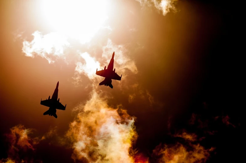 two fighter jets flying through a cloudy sky, a picture, pixabay, precisionism, suns, concert, embers flying, f18
