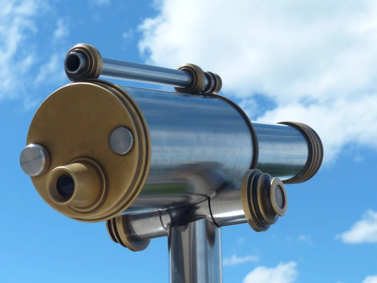 a telescope sitting on top of a metal pole, by Edward Corbett, pixabay, kinetic art, with big chrome tubes, eyes!, looking at the sky, very close shot