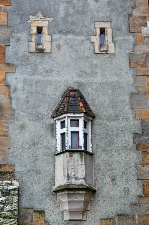 a window that is on the side of a building, inspired by Jules Tavernier, top - down photograph, sitting in a castle, unhappy, lantern