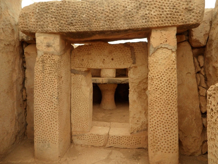 a stone structure in the middle of a desert, by Jon Coffelt, flickr, mingei, inside a tomb, impressive detail : 7, megaliths, front-view