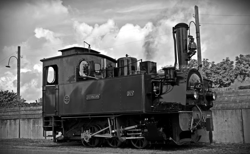 a black and white photo of a train engine, a portrait, pixabay, chilean, portrait of a small, sardax, # 7 3 c 2 fb