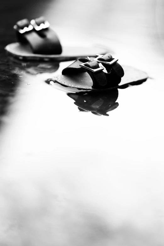 a pair of shoes that are laying on the ground