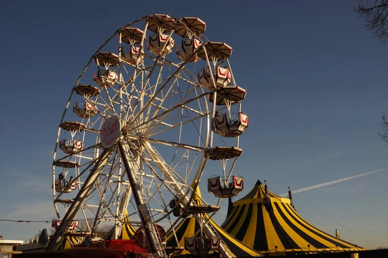 a large ferris wheel on a clear blue day