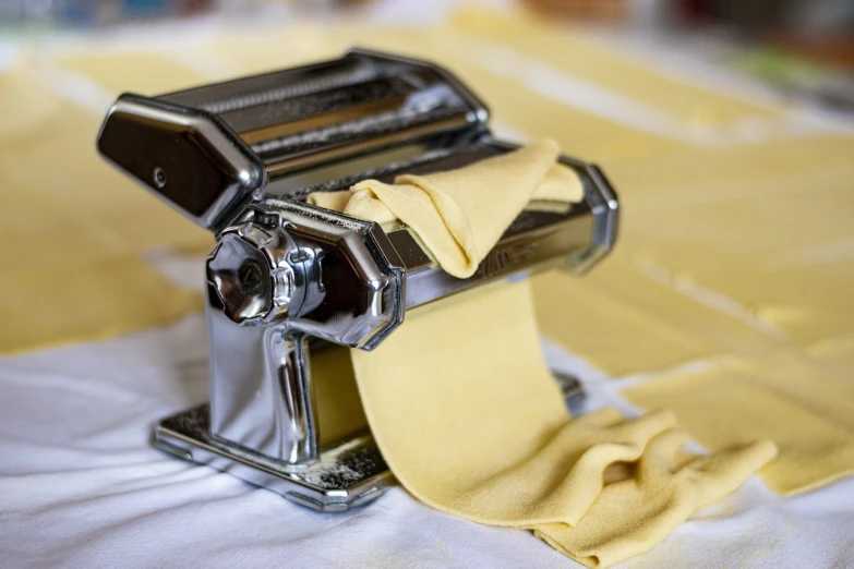 a pasta dispenser has been put on a table