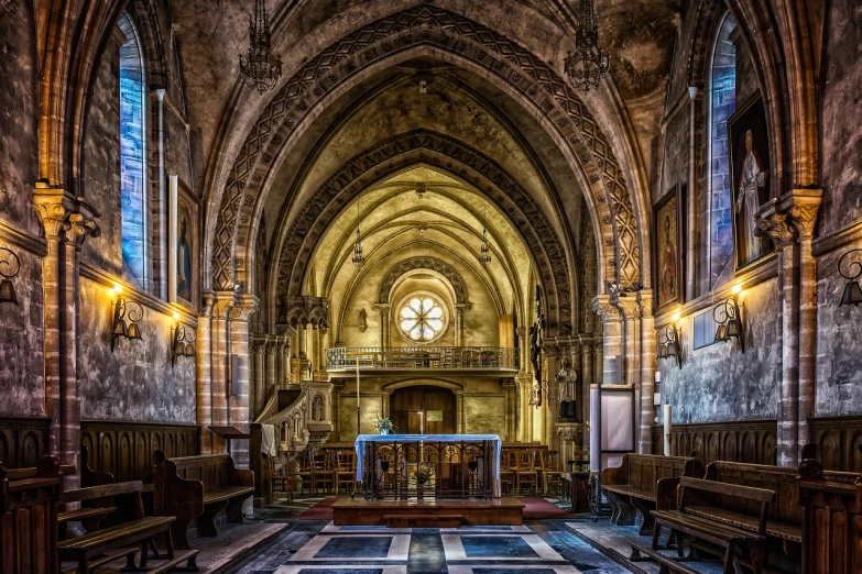 a gothic cathedral has an enormous arched window