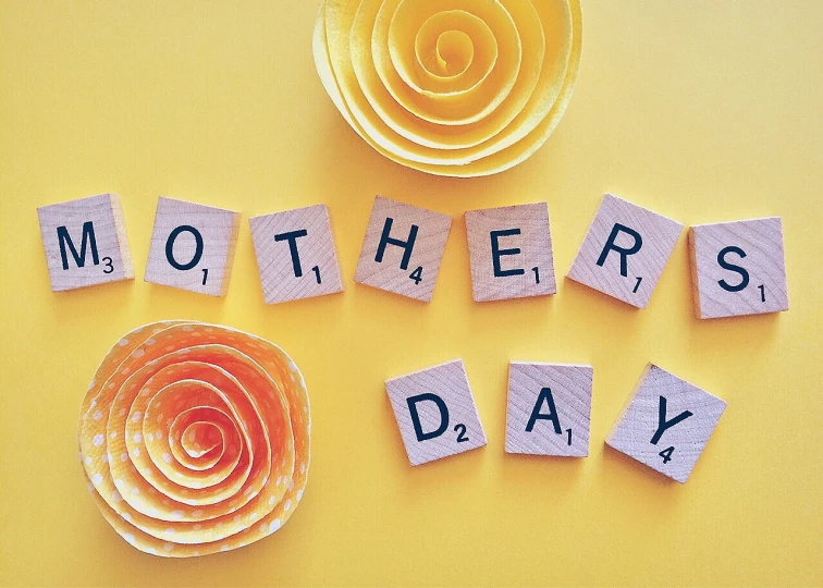 an image of mother's day spelled with magnets