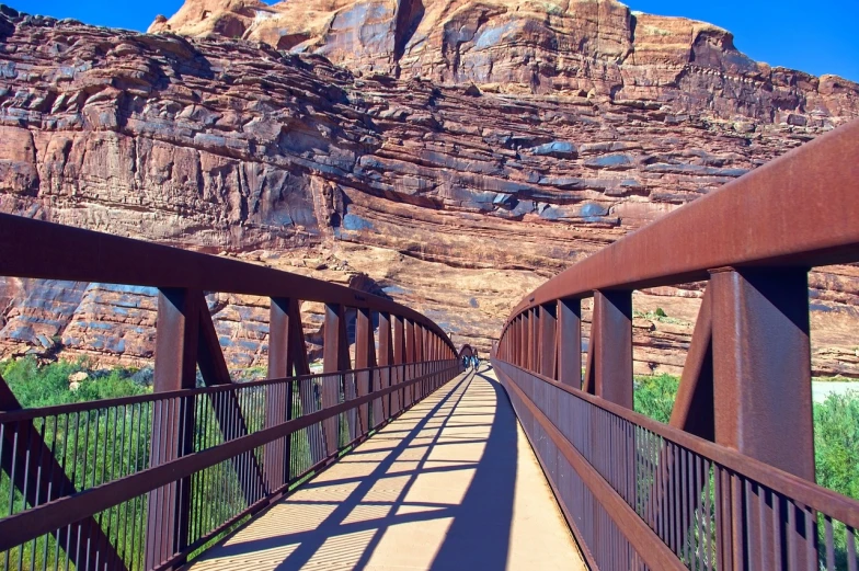 a tall mountain that has some brown rails on it