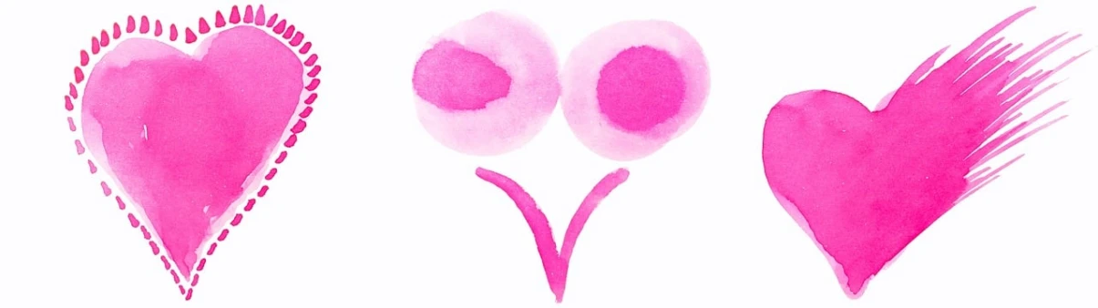 three pink hearts that are in different positions