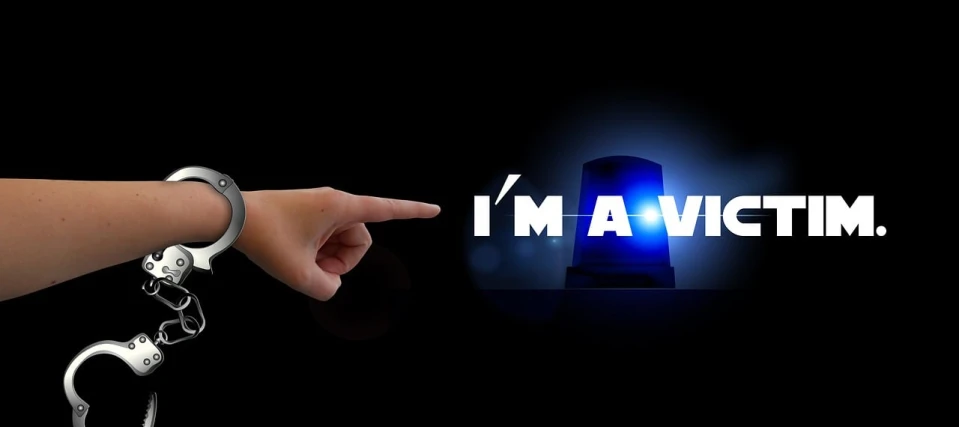 a hand points towards an i - mavgitm logo