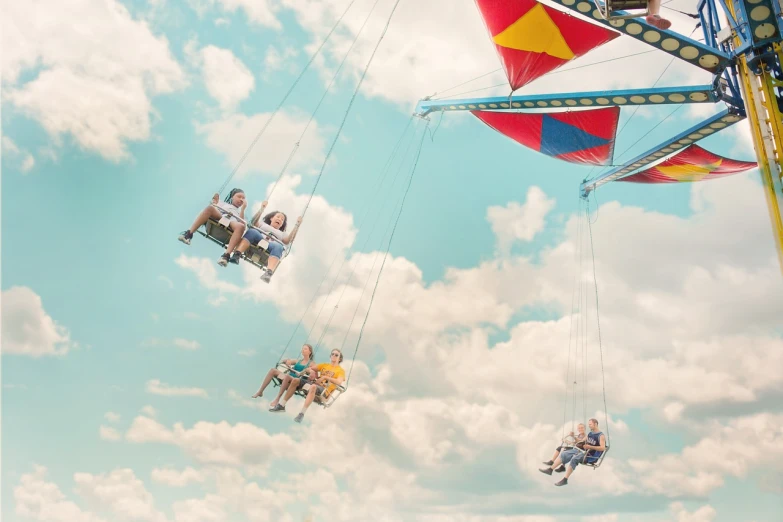 people riding on ferris wheel during a carnival