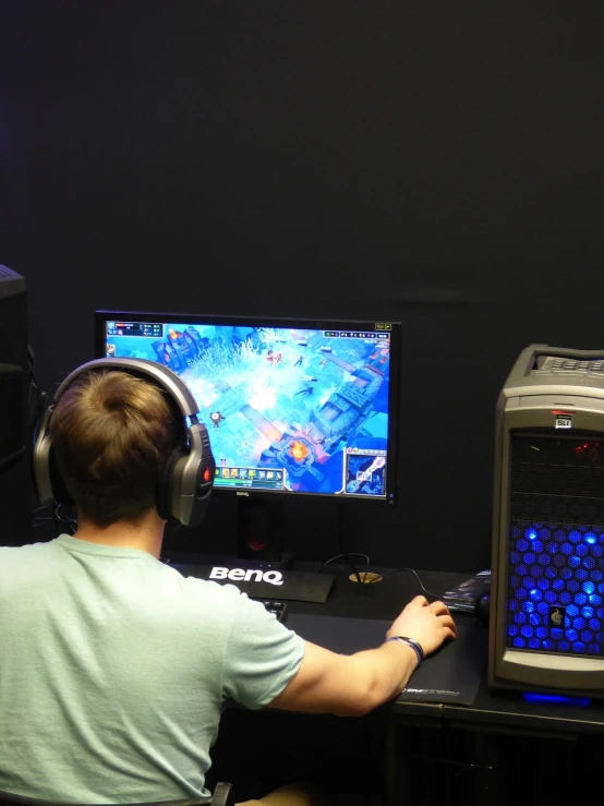 two men playing on video game equipment and a remote