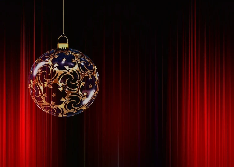 an ornament is hanging on a red curtain