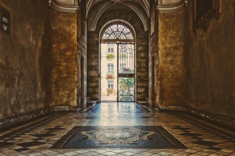 the entrance to a building with arched doorways