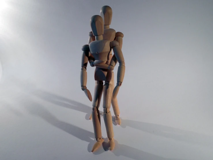 some kind of human - like action figure standing alone