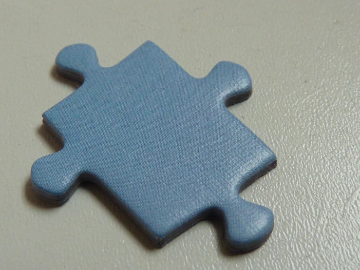 this is an image of a blue puzzle piece