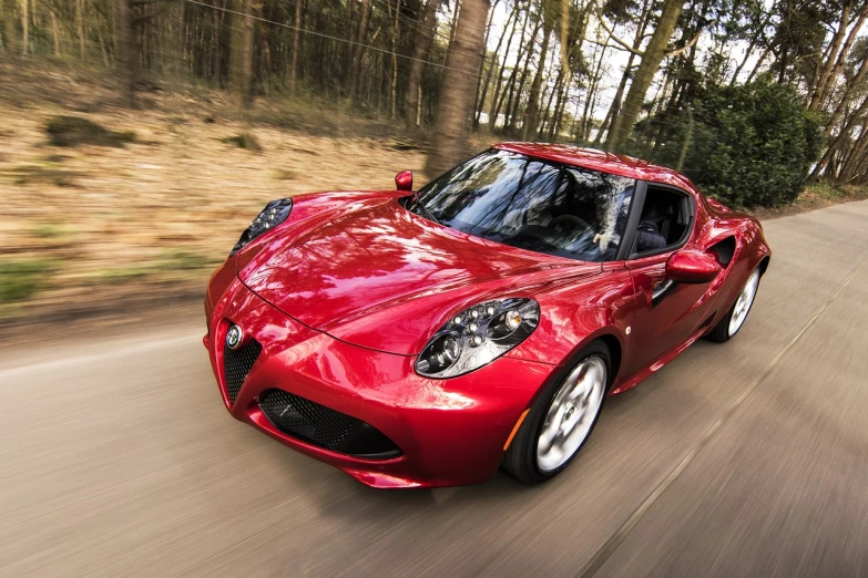 the front end of a red sports car