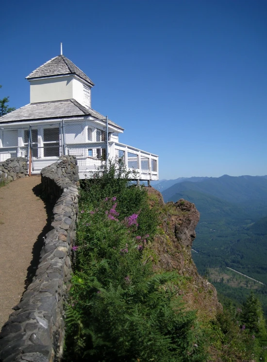 a house on the top of a mountain