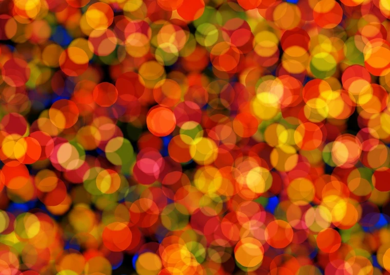 an abstract blurry background of small round lights