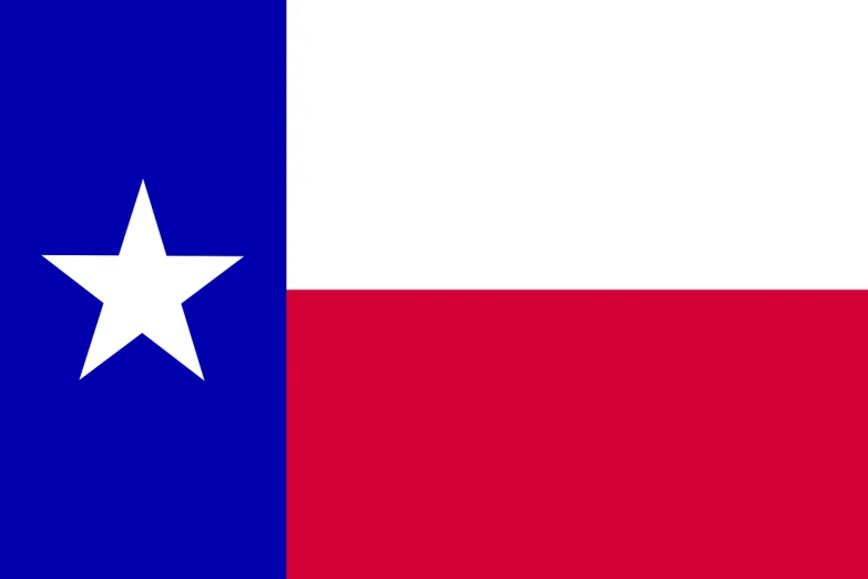 a close up of a texas flag in the middle of the day