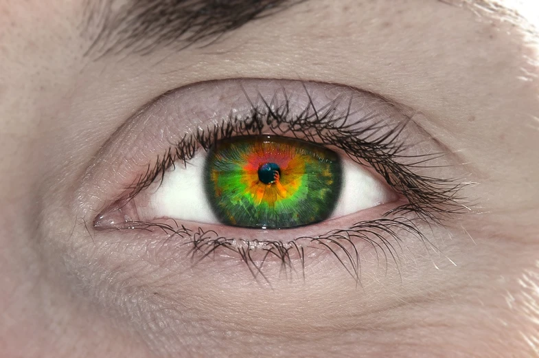 an eye with the colors of a rainbow