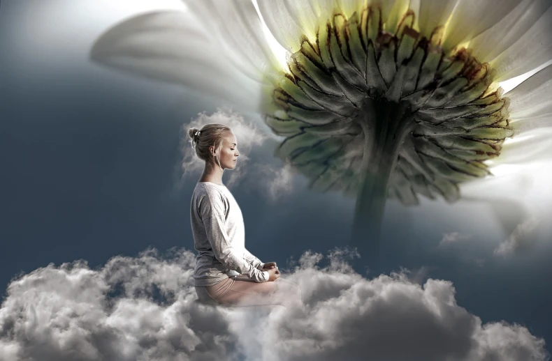 a woman that is sitting in the middle of some clouds