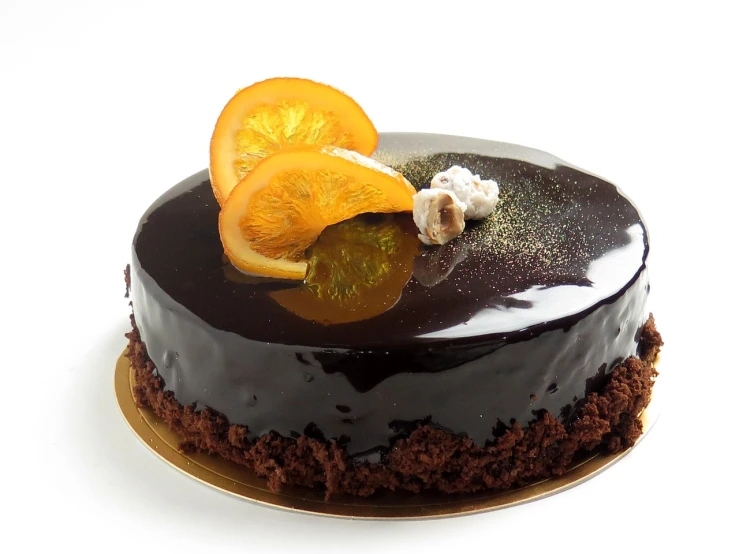there is a cake decorated with orange slices