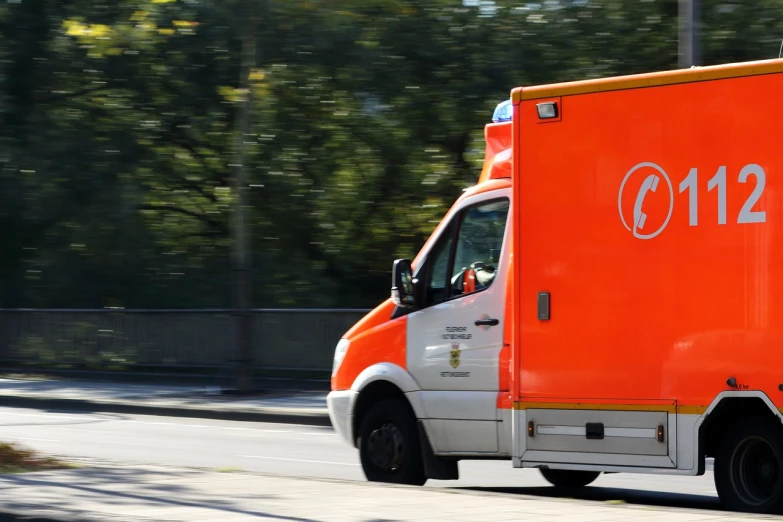 a delivery truck traveling on a city street