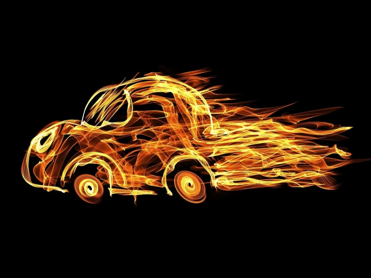 a  wheelie car on fire on a black background