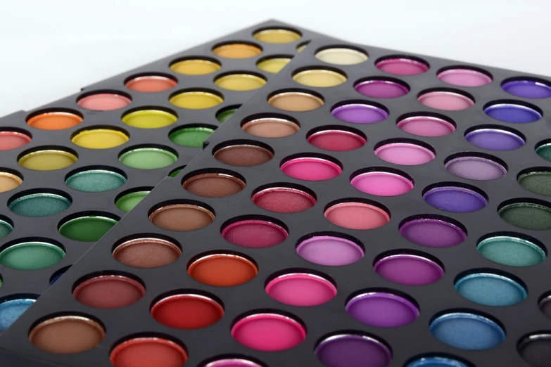 an array of makeup samples with many colors in them