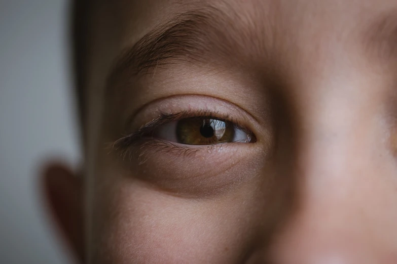 an eye view from the top of a child's face