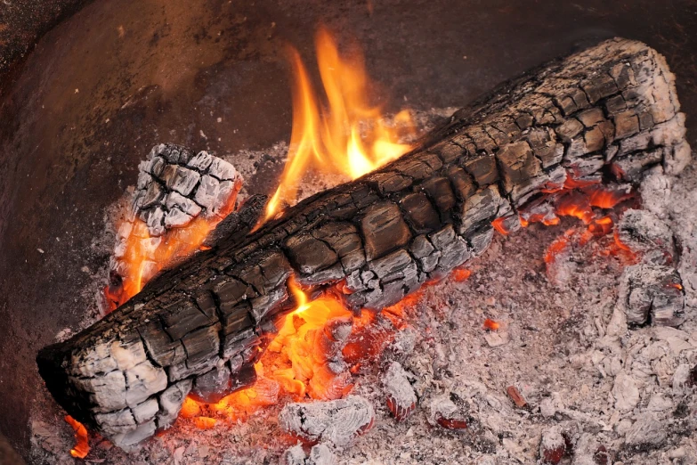 an open fire with bright yellow and orange flames