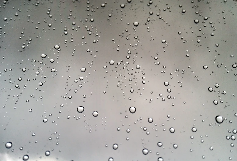 a close up view of raindrops on a window