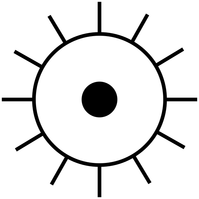 a white circular object with several different shapes in it