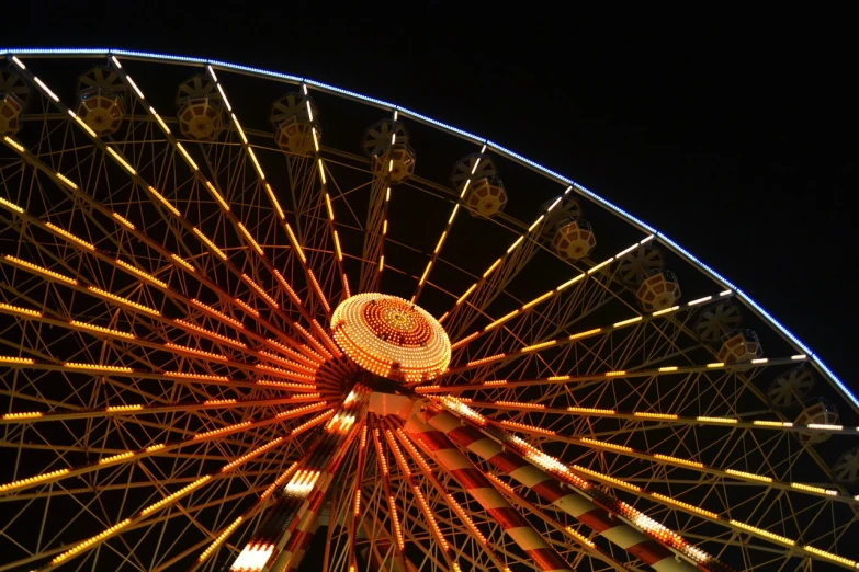 the ferris wheel has been spinning from four different sections