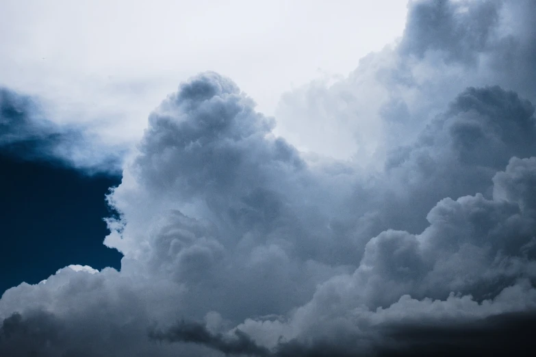 some clouds that have been turned into dark blue