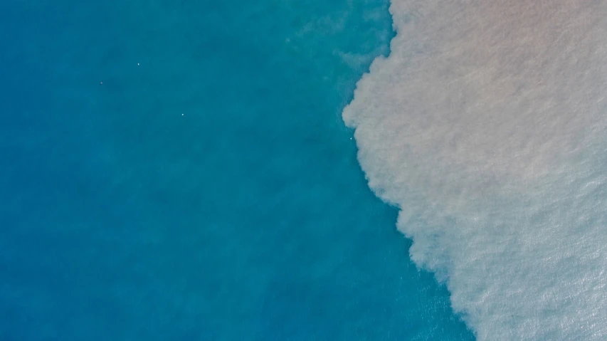 an aerial view of the ocean from above