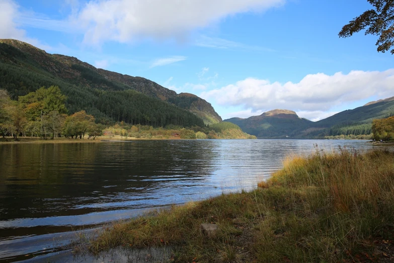 the scenery is of an outdoor lake