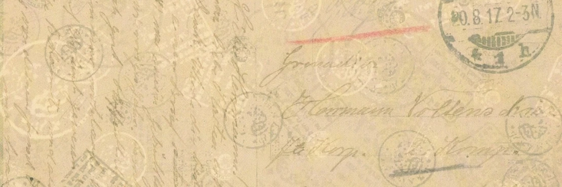 a closeup of an old envelope with stamps on it