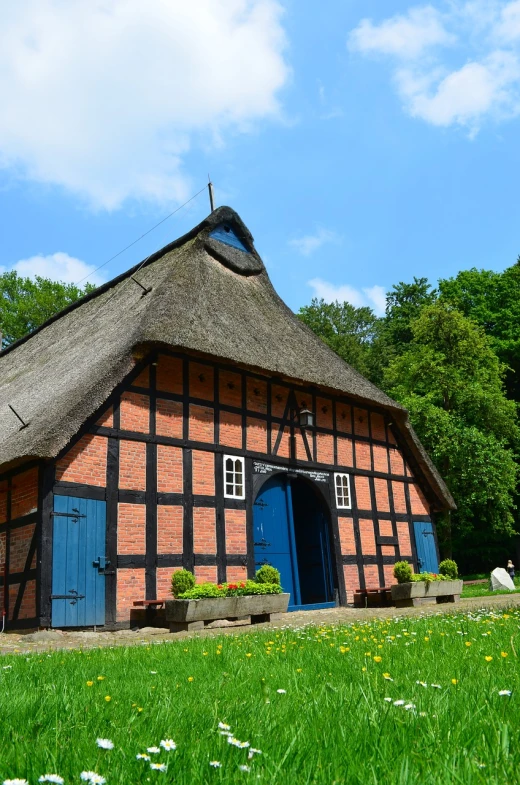 this is an old german house with a thatched roof