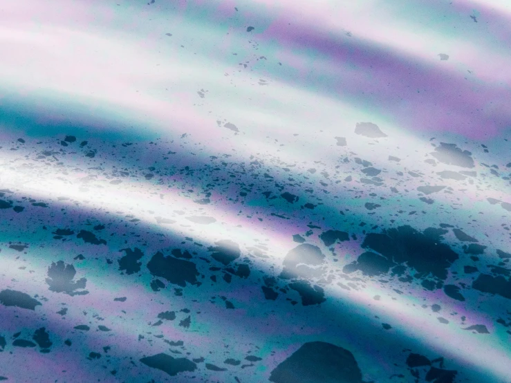 an image of liquid swirling on a surface