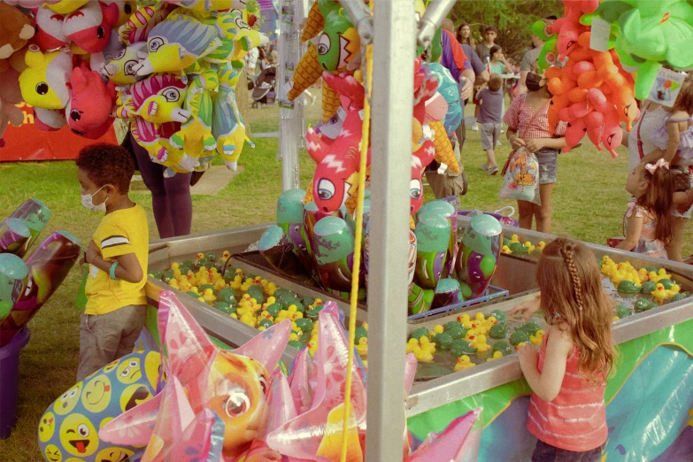 there is a  and boy looking at an elaborate display of floats