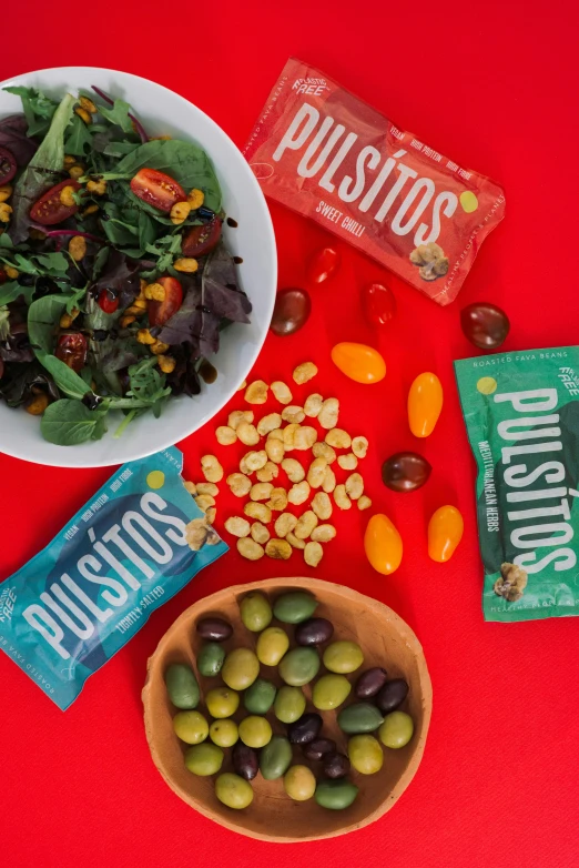 different types of nuts are placed next to a bowl with some of the things on it